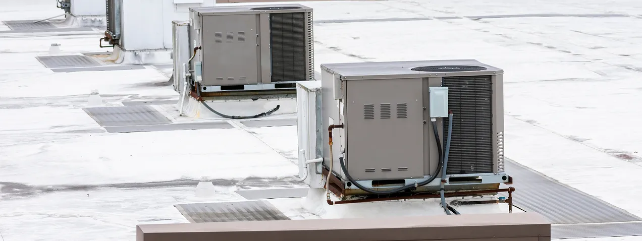 Light commercial rooftop HVAC unit serviced by Summit Comfort Solutions HVAC